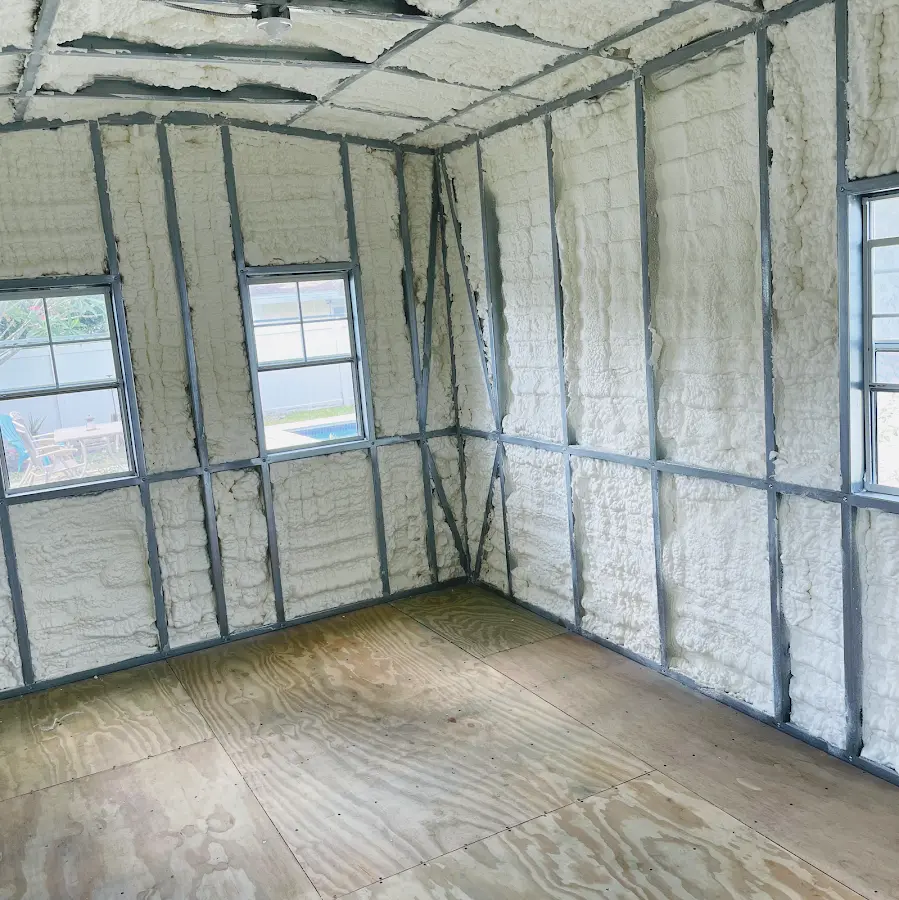 Closed-cell spray foam insulation applied to wall cavities in a residential project in Glen Carbon